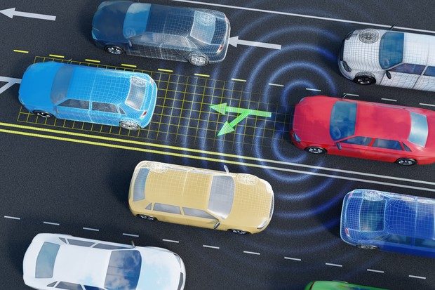 Image of vehicles on a motorway going both directions with an autonomous self-driving car analysing traffic situation on the road with sensors and artificial intelligence. 